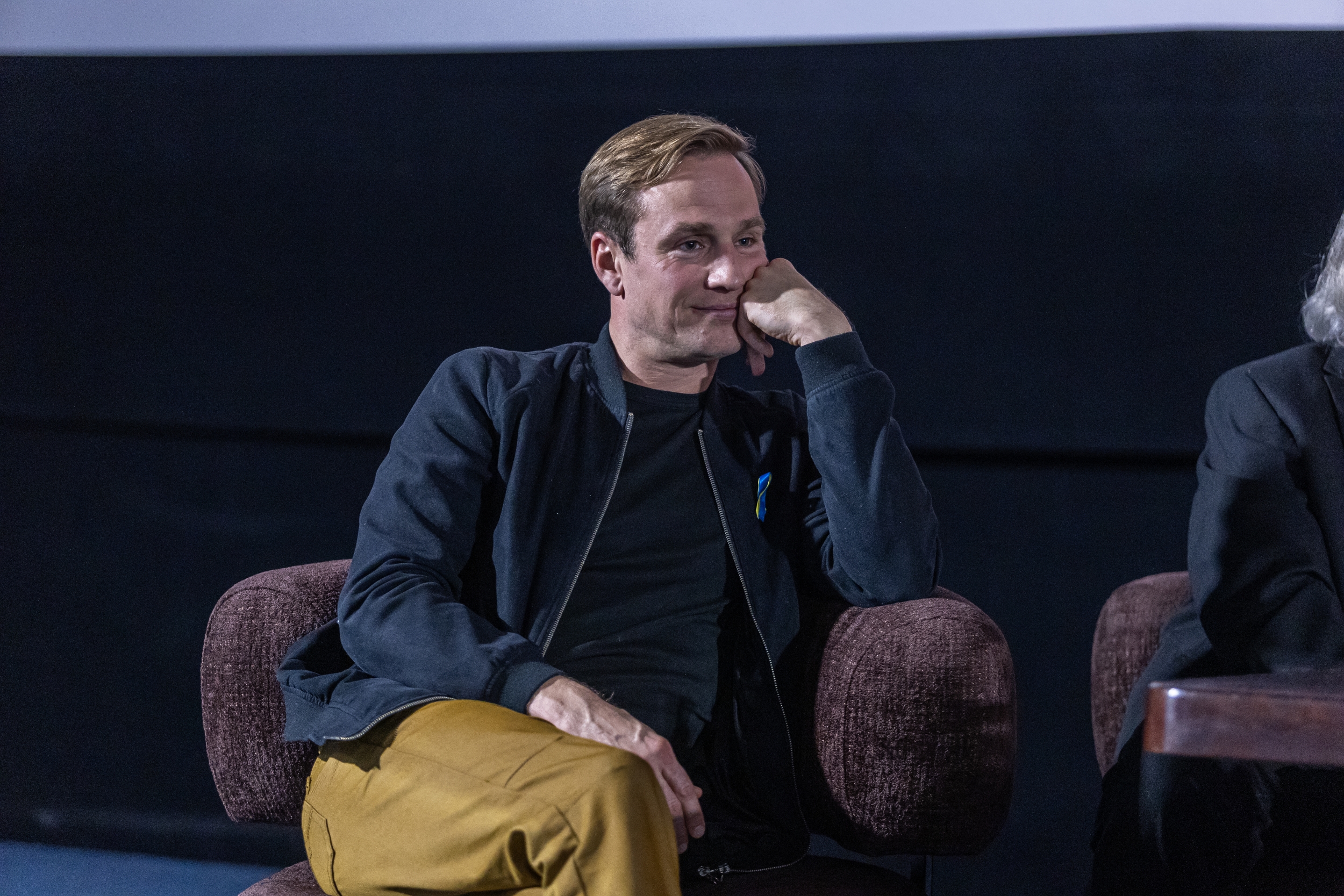 na zdjęciu sala kinowa z ludźmi