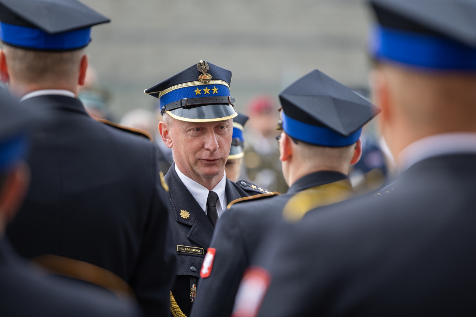 na zdjęciu osoby podczas uroczystości 