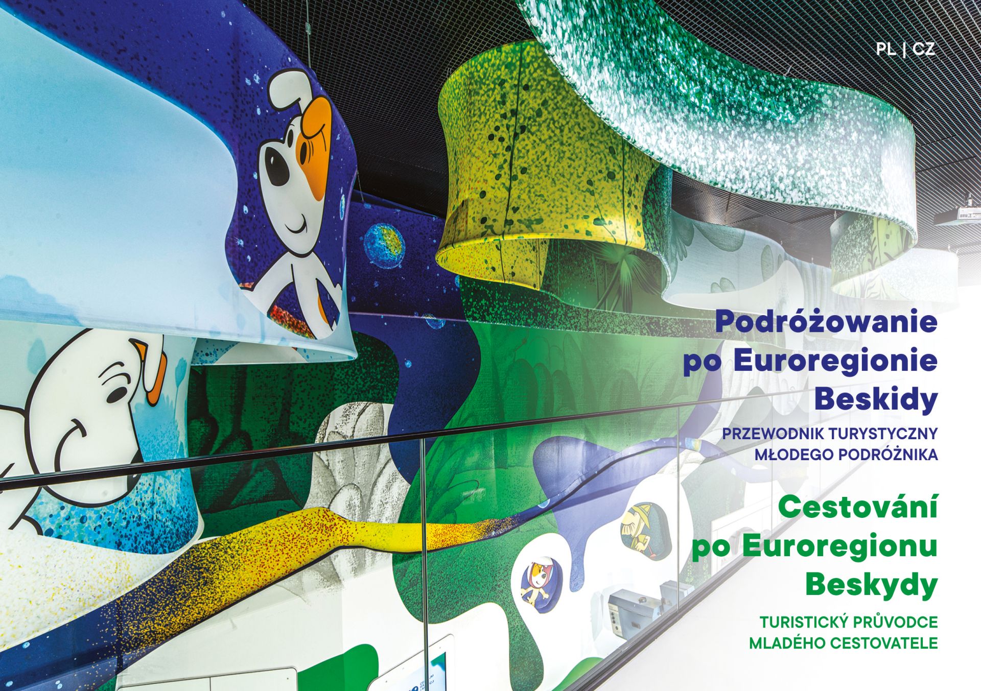 Na zdjęciu Przewodniki dla dzieci i dorosłych po Euroregionie Beskidy oraz kolorowanki