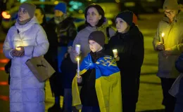 na zdjęciu osoby podczas modlitwy