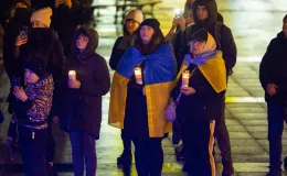 na zdjęciu osoby podczas modlitwy