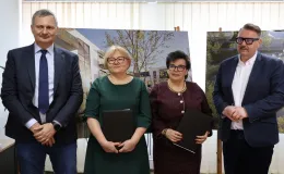 na zdjęciu osoby podczas podpisania