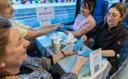 na zdjęciu osoby podczas spotkania