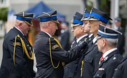 na zdjęciu osoby podczas uroczystości 