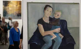 na zdjęciu osoby podczas wystaw