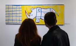 na zdjęciu osoby podczas wystaw