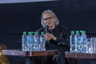 na zdjęciu sala kinowa z ludźmi