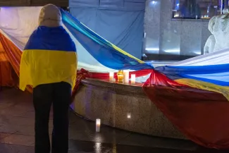 na zdjęciu osoby podczas modlitwy