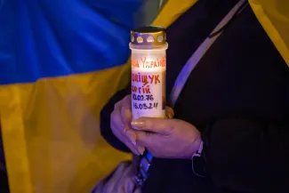 na zdjęciu osoby podczas modlitwy