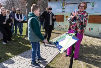 na zdjęciu osoby podczas spotkania