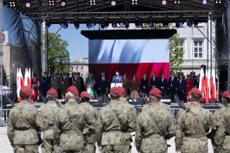 na zdjęciu osoby podczas uroczystości