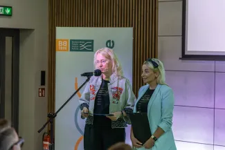 na zdjęciu osoby podczas konferencji
