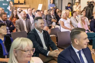 na zdjęciu osoby podczas konferencji