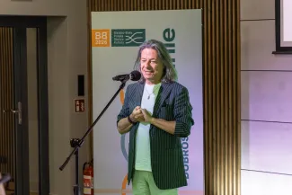 na zdjęciu osoby podczas konferencji