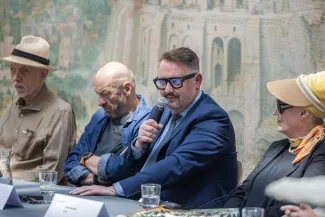 na zdjęciu osoby podczas konferencji
