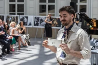 na zdjęciu osoby podczas konferencji