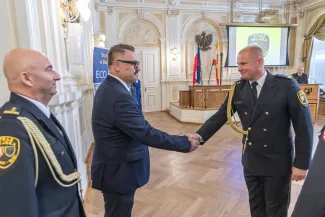 na zdjęciu osoby podczas uroczyści